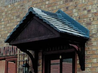 Carisbrooke style overdoor traditional tiled canopy